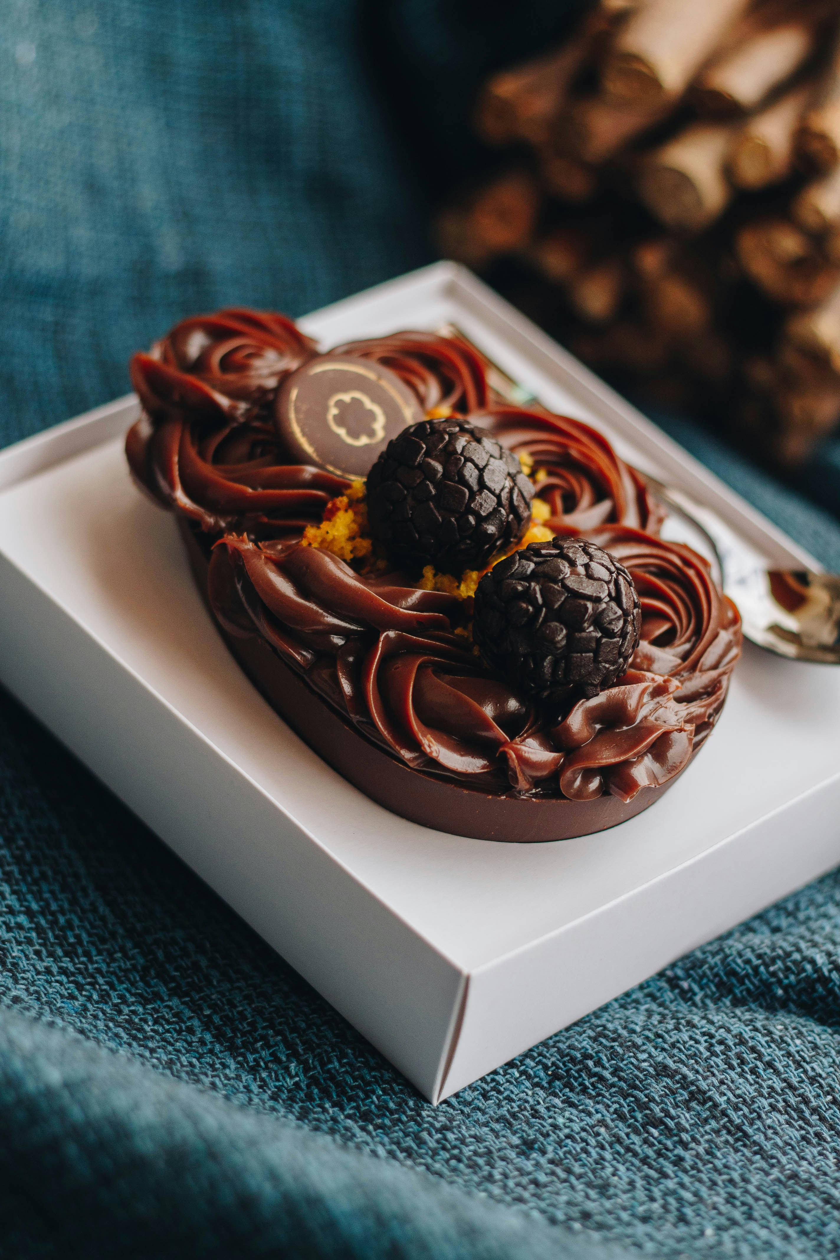 a chocolate cake with raspberries on top of it