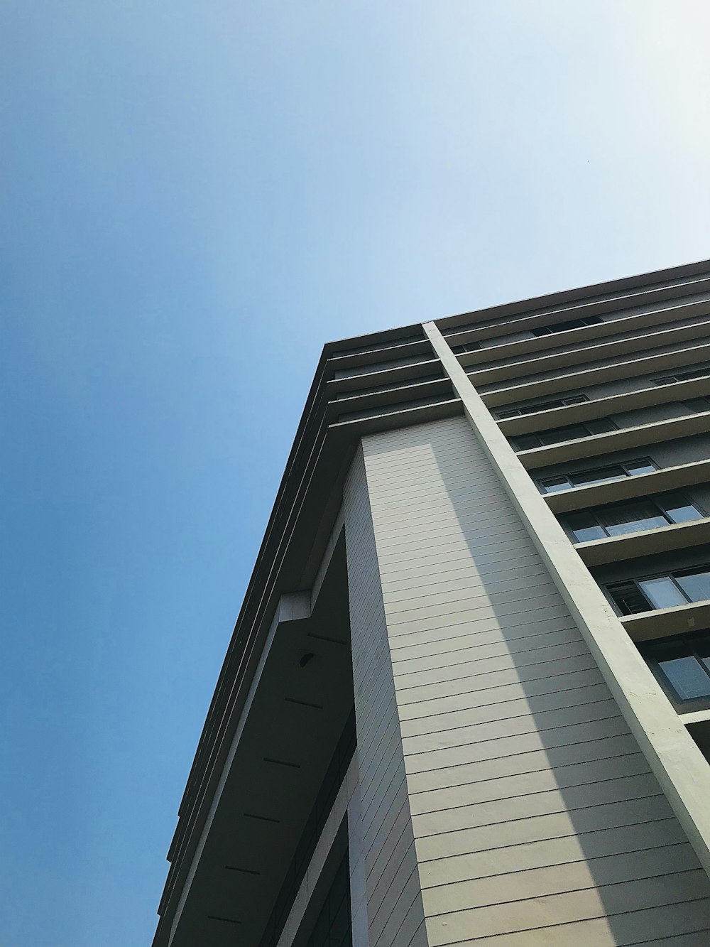 a tall building with a clock on the side of it