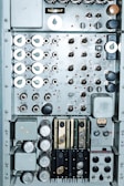 Control box featuring intricate pressed components.