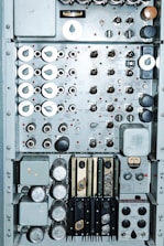 Close-up of control panel with digital displays and switches for automation.