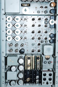 Close-up of a control panel featuring DCS and PLC components.