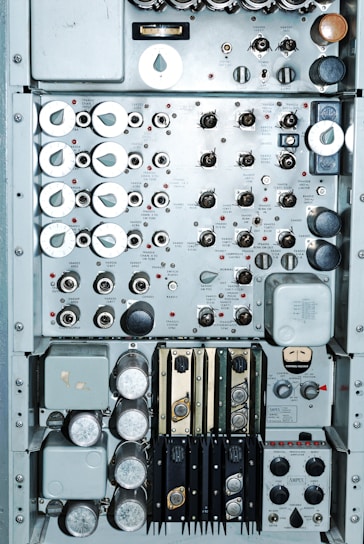 A detailed close-up of a custom-built automation control panel with wiring and components.