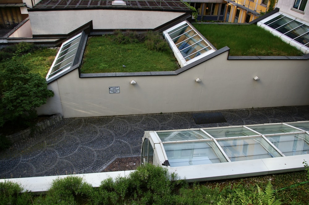 a house with a green roof and a green roof