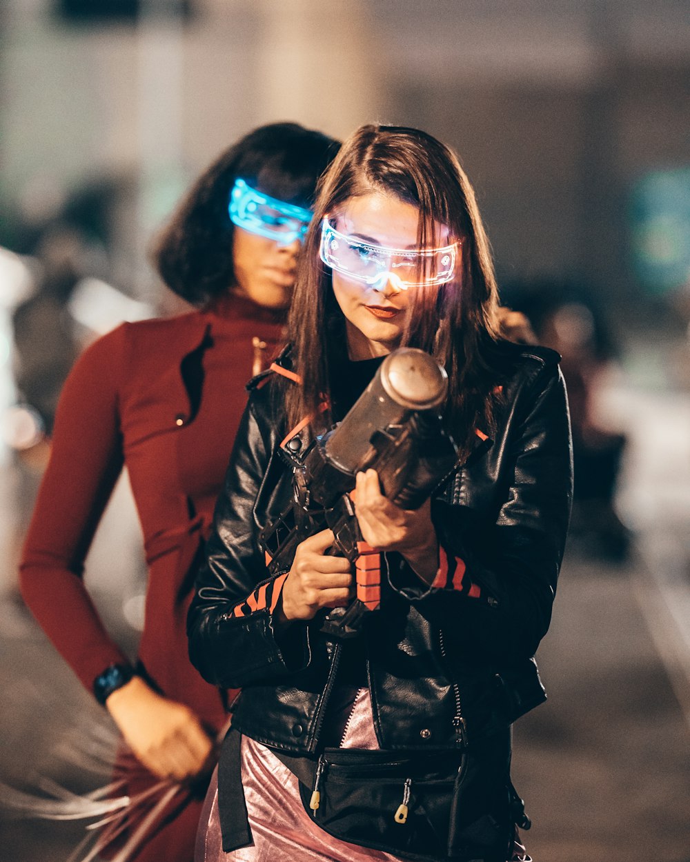 a couple of women standing next to each other