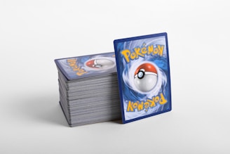 a stack of pokemon cards sitting on top of each other