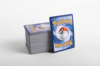 a stack of pokemon cards sitting on top of each other