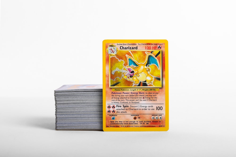 a stack of pokemon cards sitting on top of each other