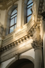 Architectural model illuminated by soft slate lighting, highlighting intricate details.