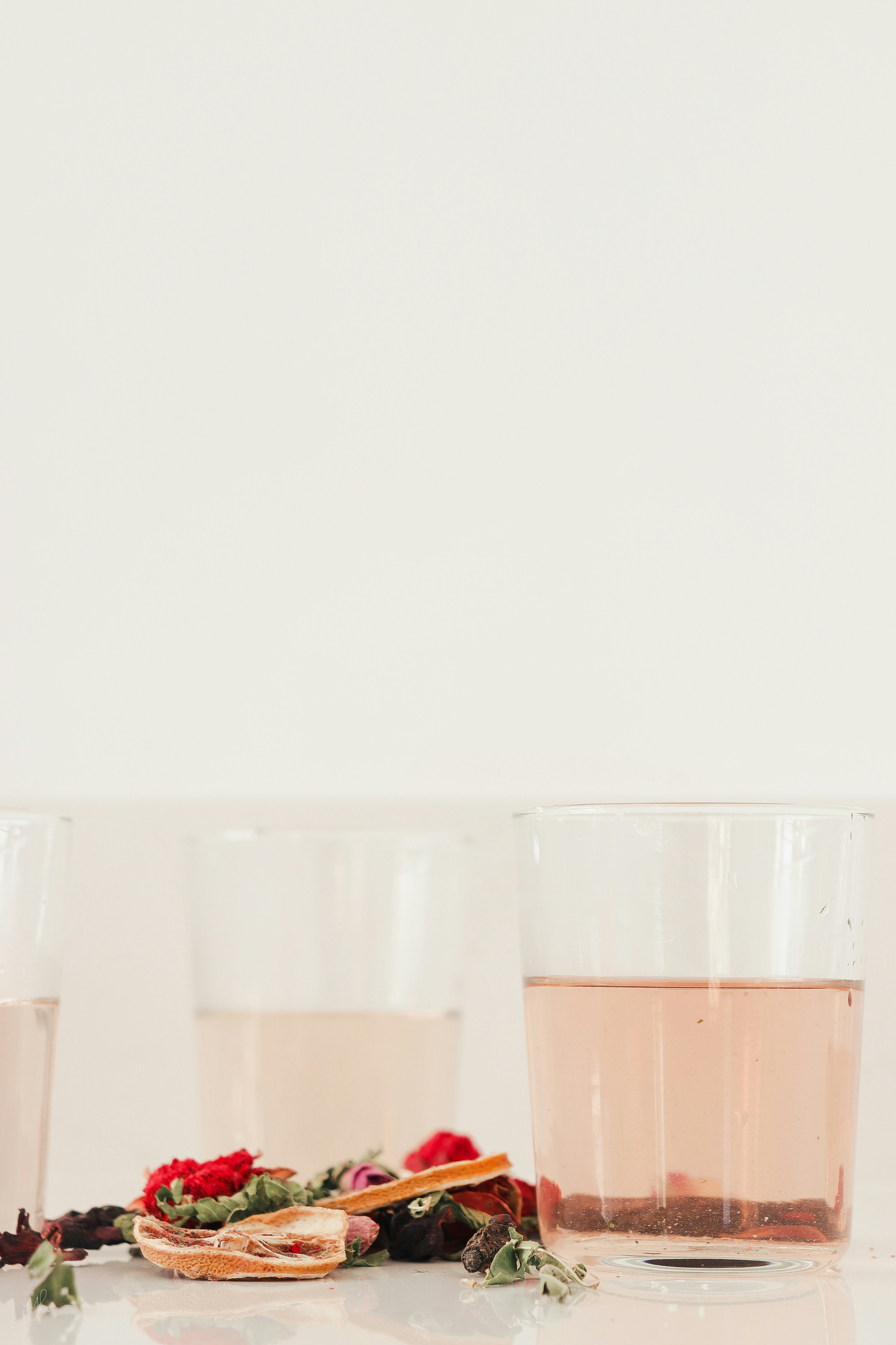 a couple of glasses of water sitting on top of a table