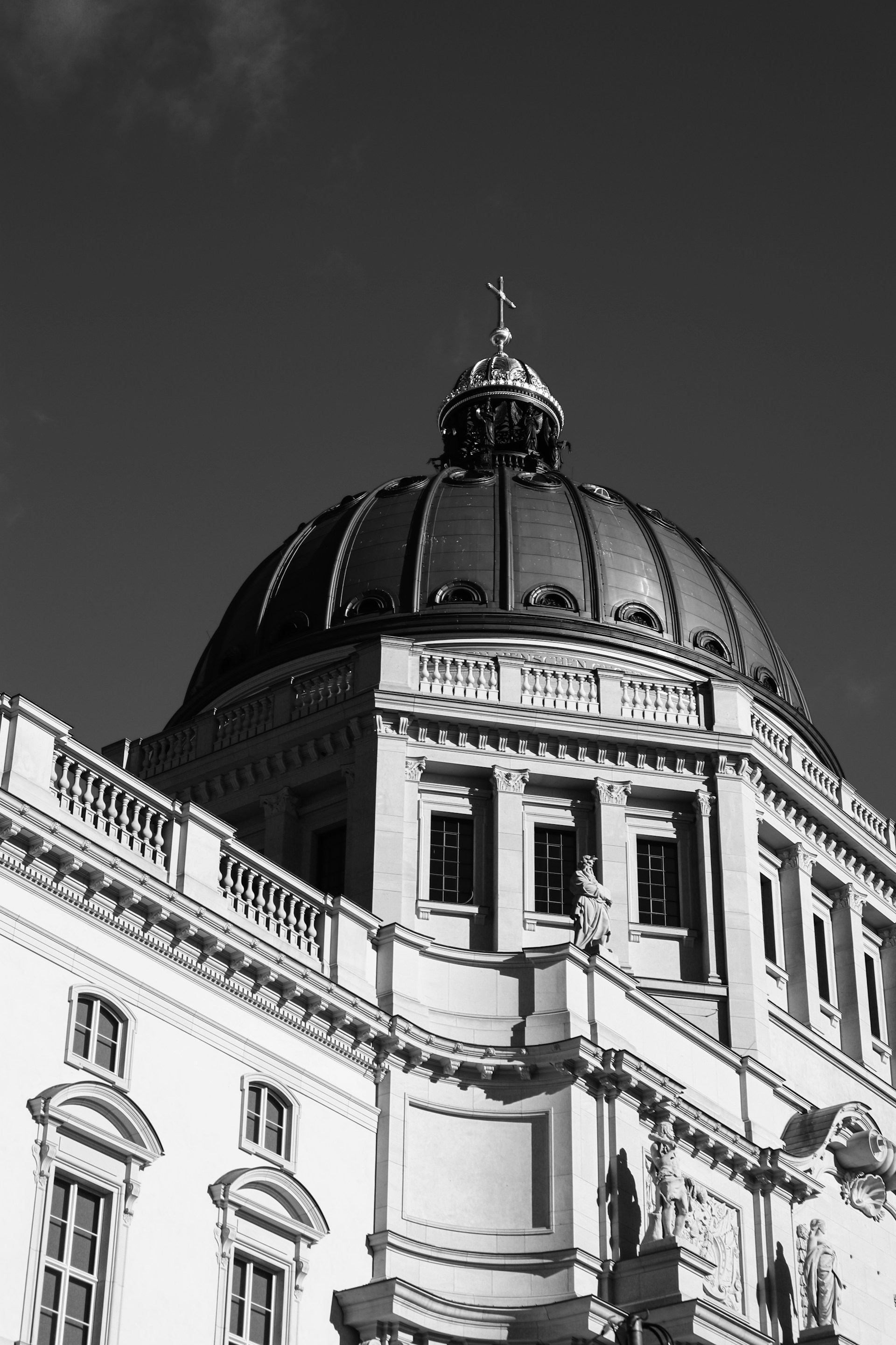a black and white photo of a building with a dome