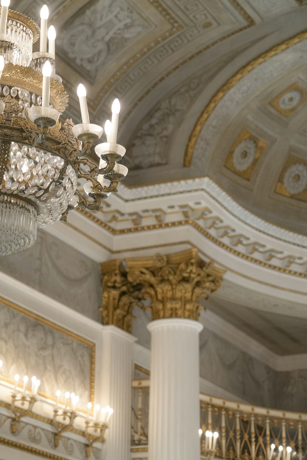 a chandelier hanging from the ceiling of a building