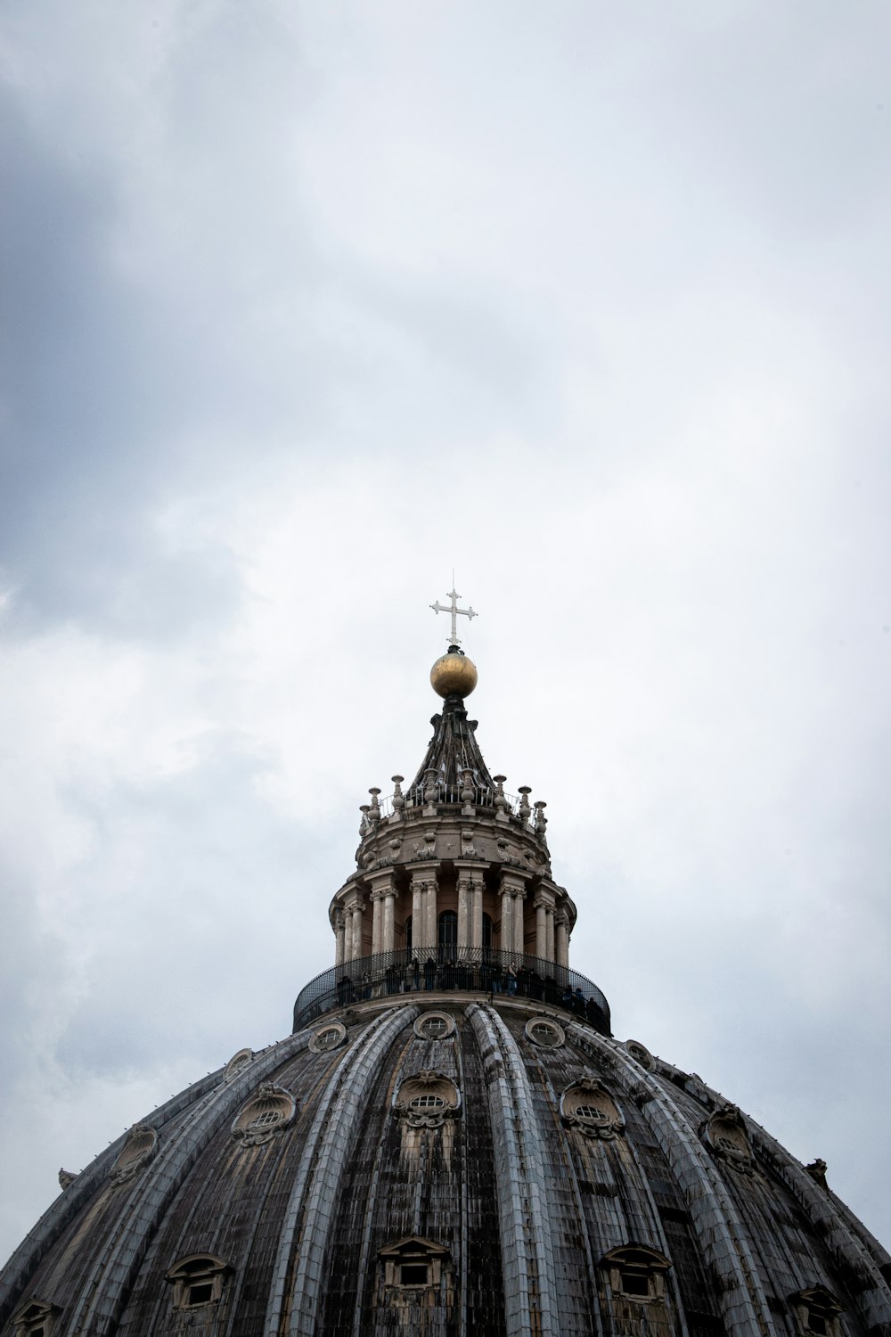 a large dome with a cross on top of it