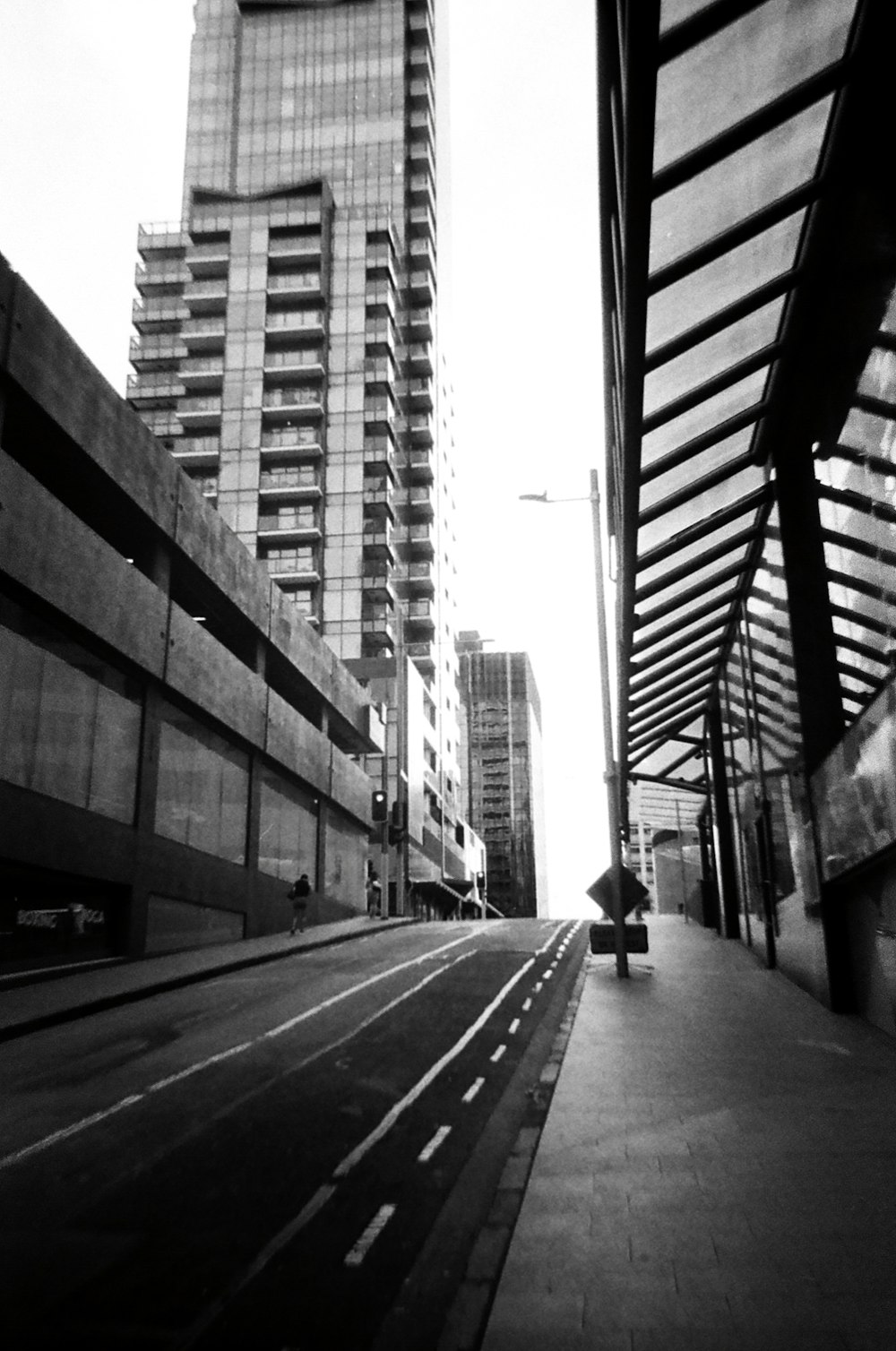 a black and white photo of a city street