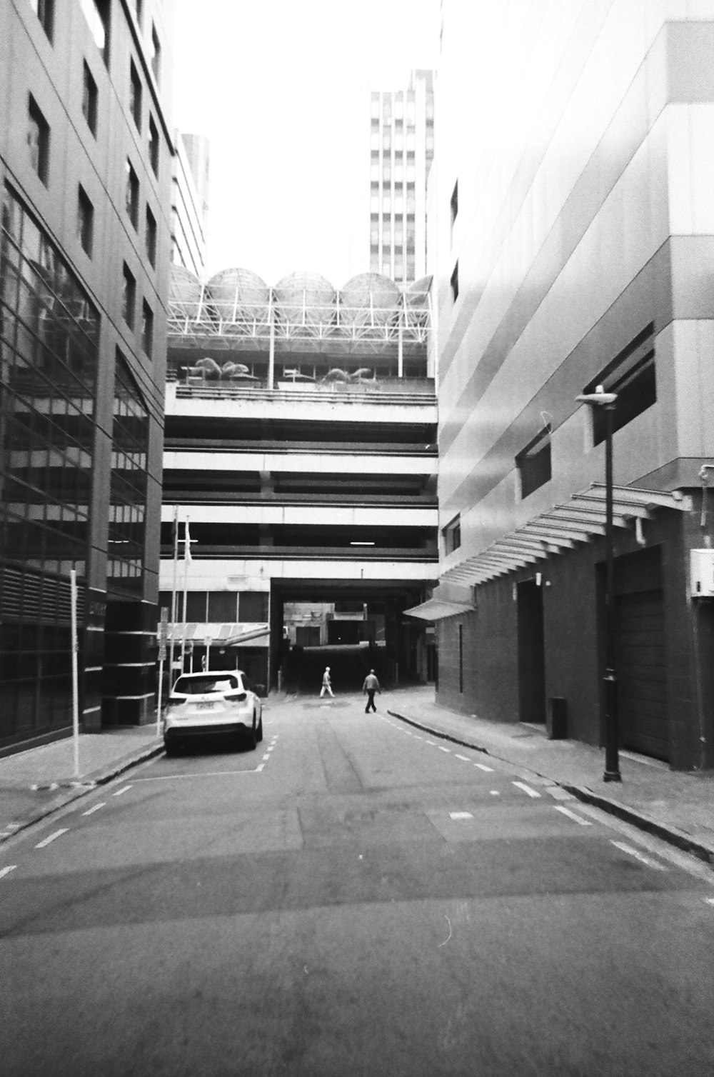 a black and white photo of a city street