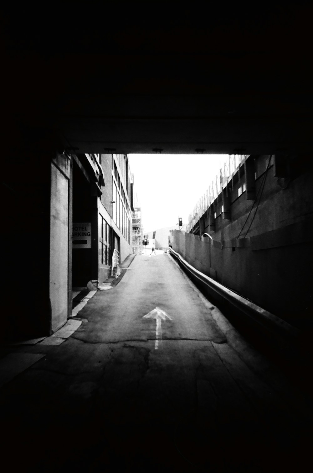 a black and white photo of an empty street