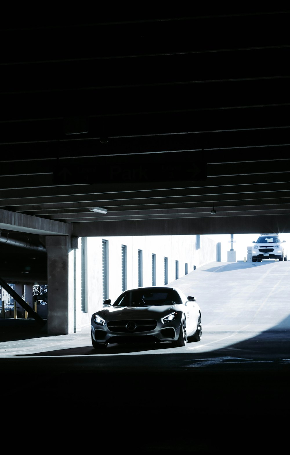 a car is parked in a parking garage