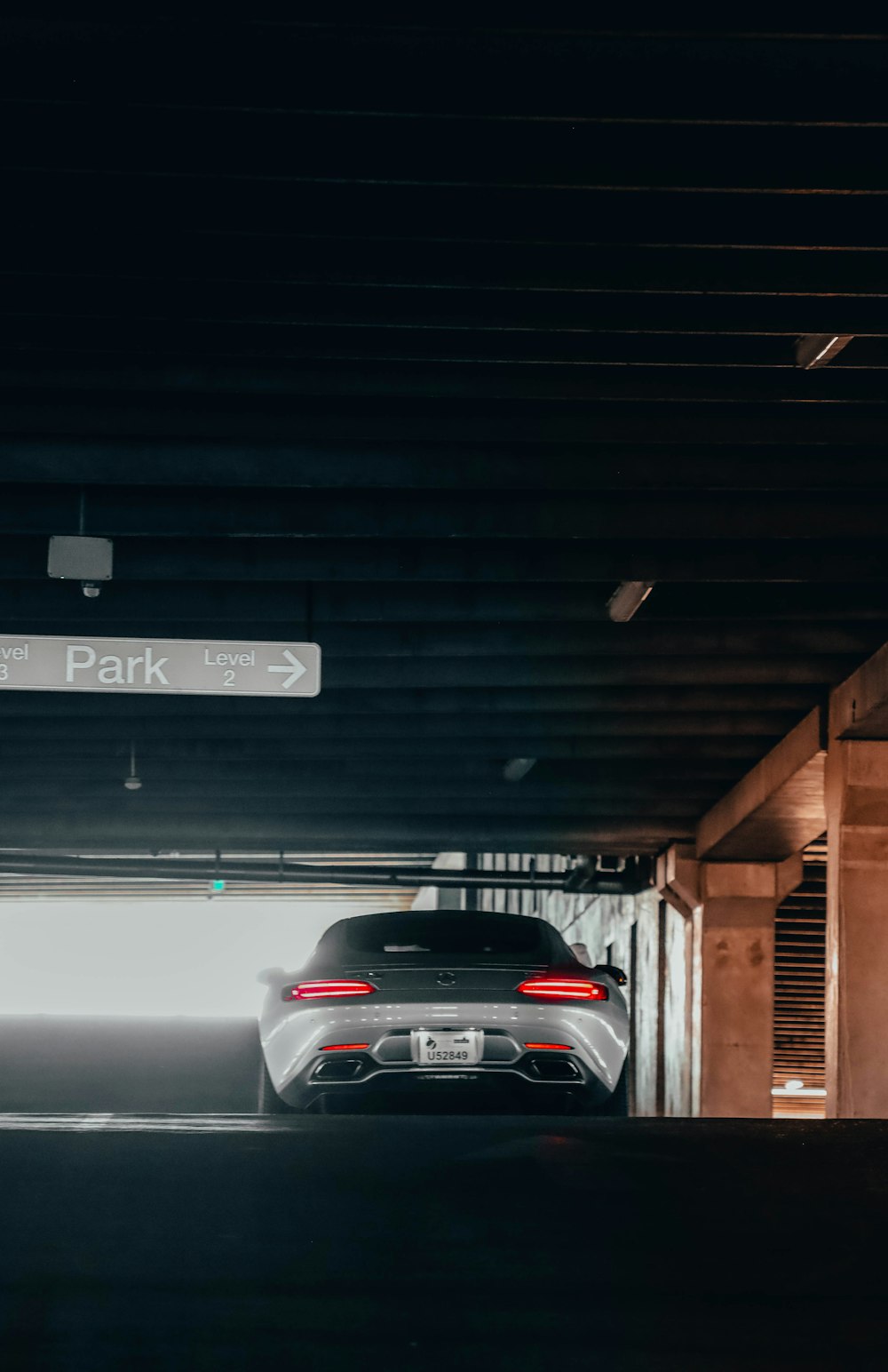 a car is parked in a parking garage