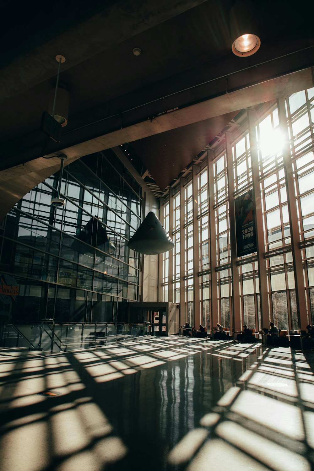 the sun shines through the windows of a building