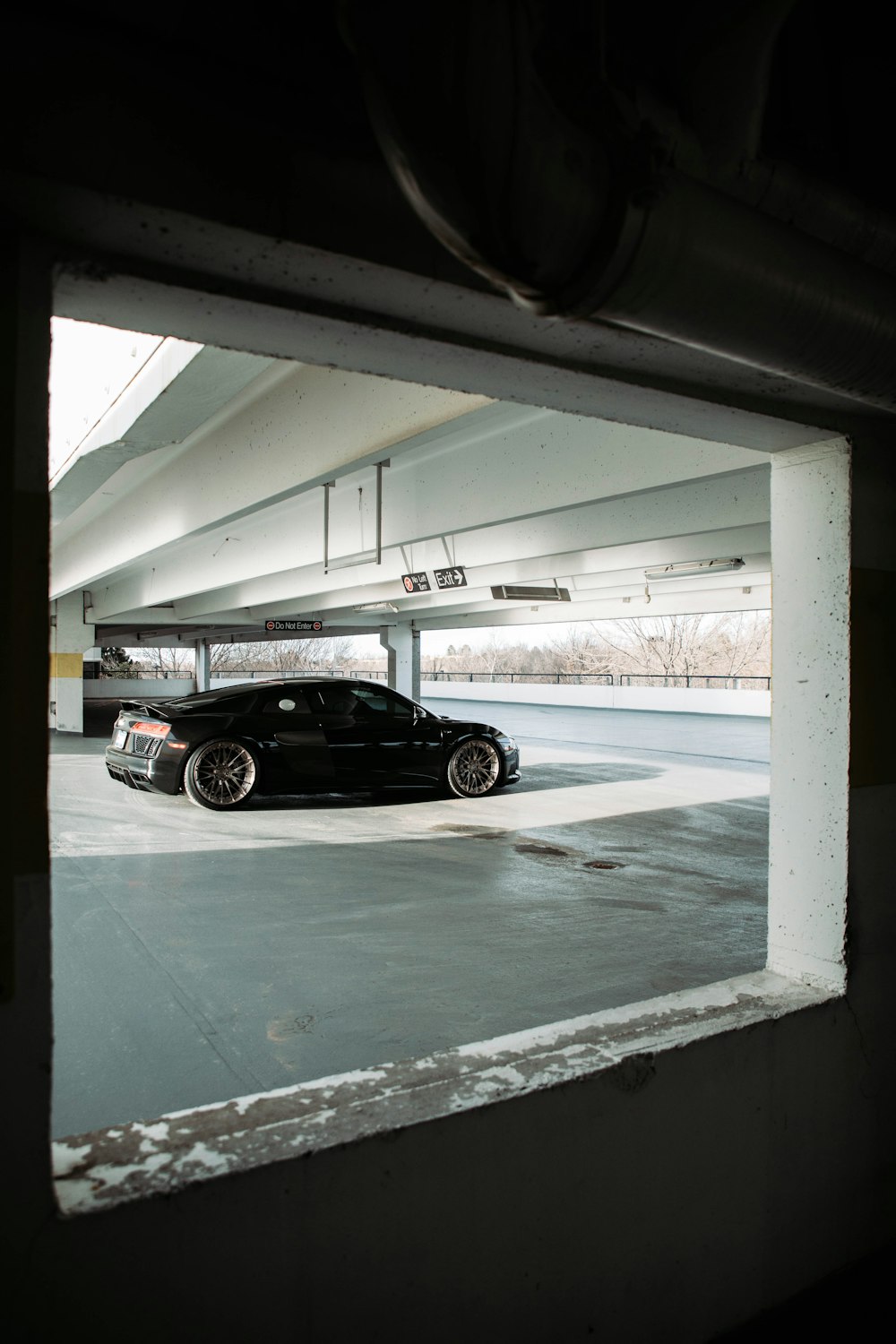 a car is parked in a parking garage