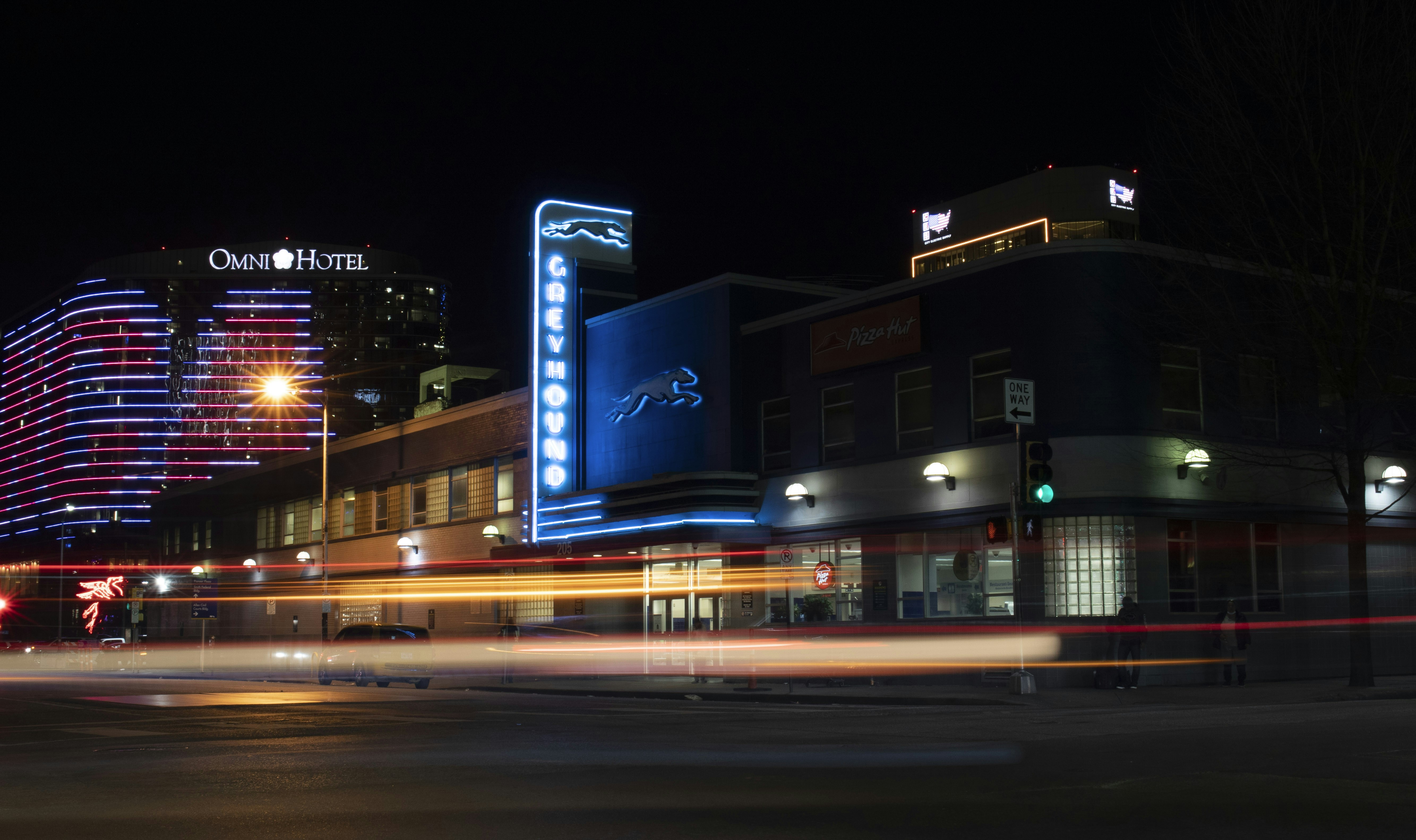 a blurry photo of a city street at night