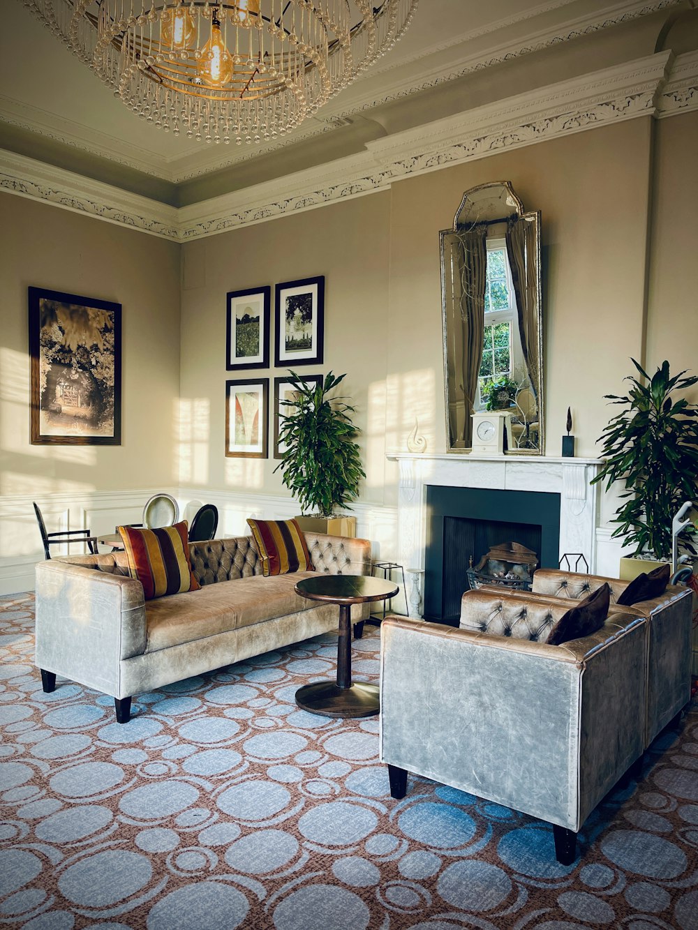 a living room filled with furniture and a fire place