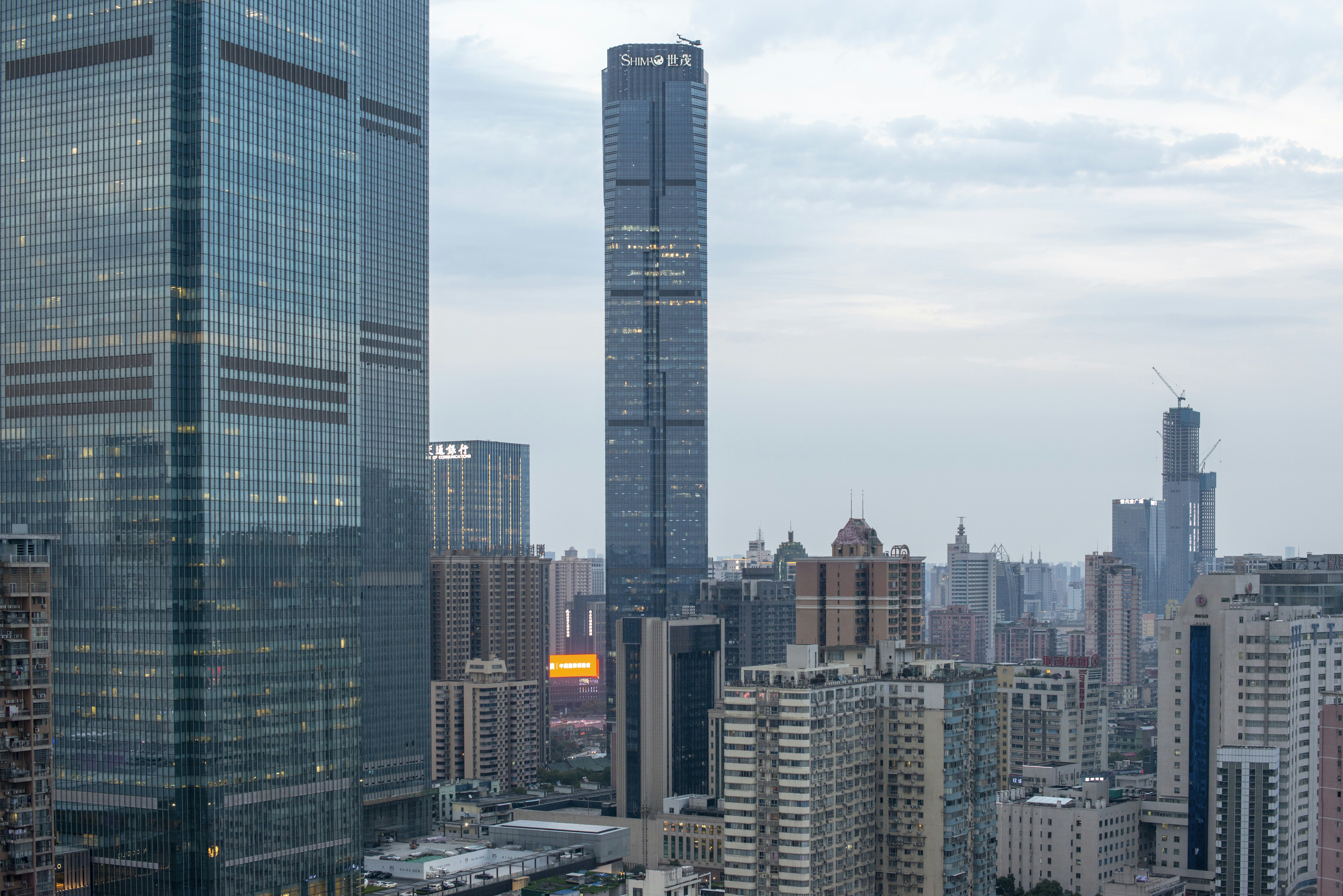 a view of a city with tall buildings