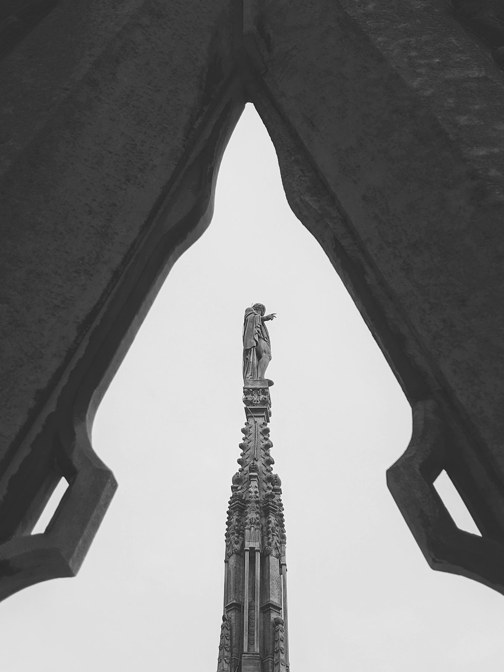 a black and white photo of a tall building