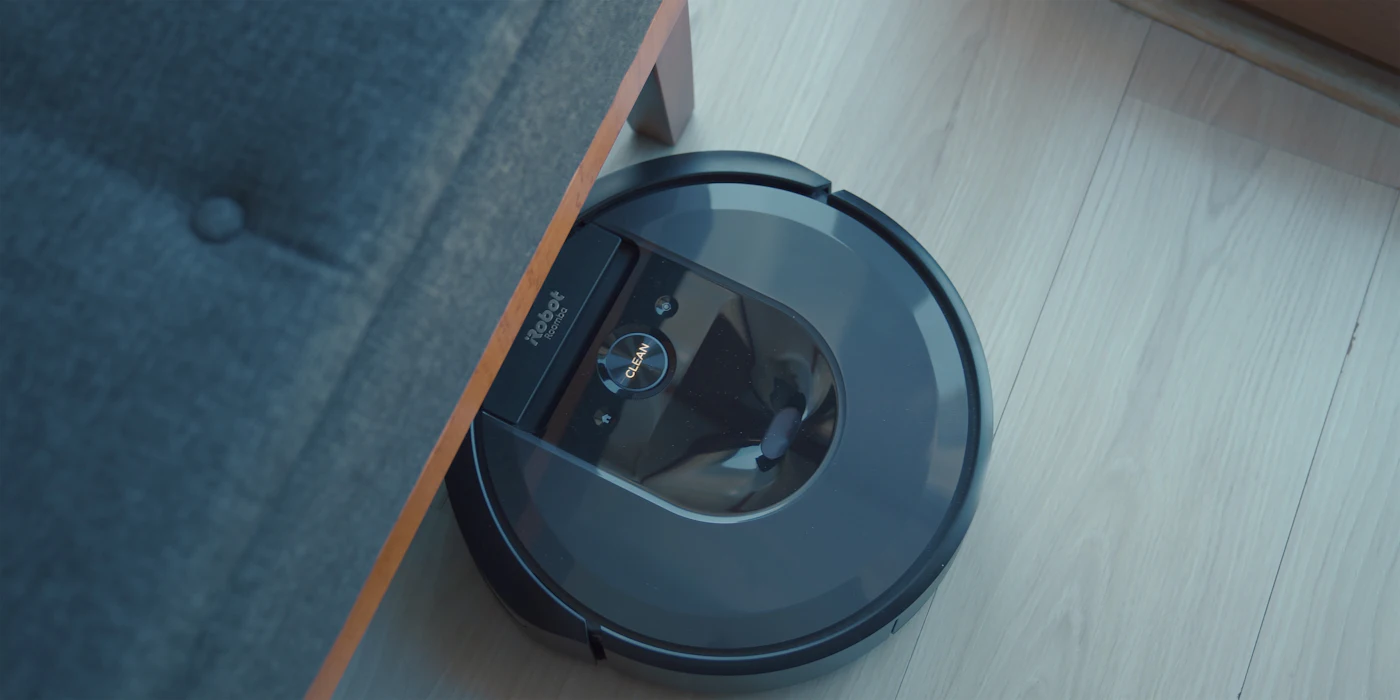 Robots do the daily upkeep; a stick vacuum handles the rest.