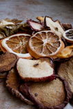 Close-up of compact food dehydrator with digital controls and trays of drying vegetables
