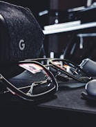 Meta-style AI glasses with transparent display in a modern setting.