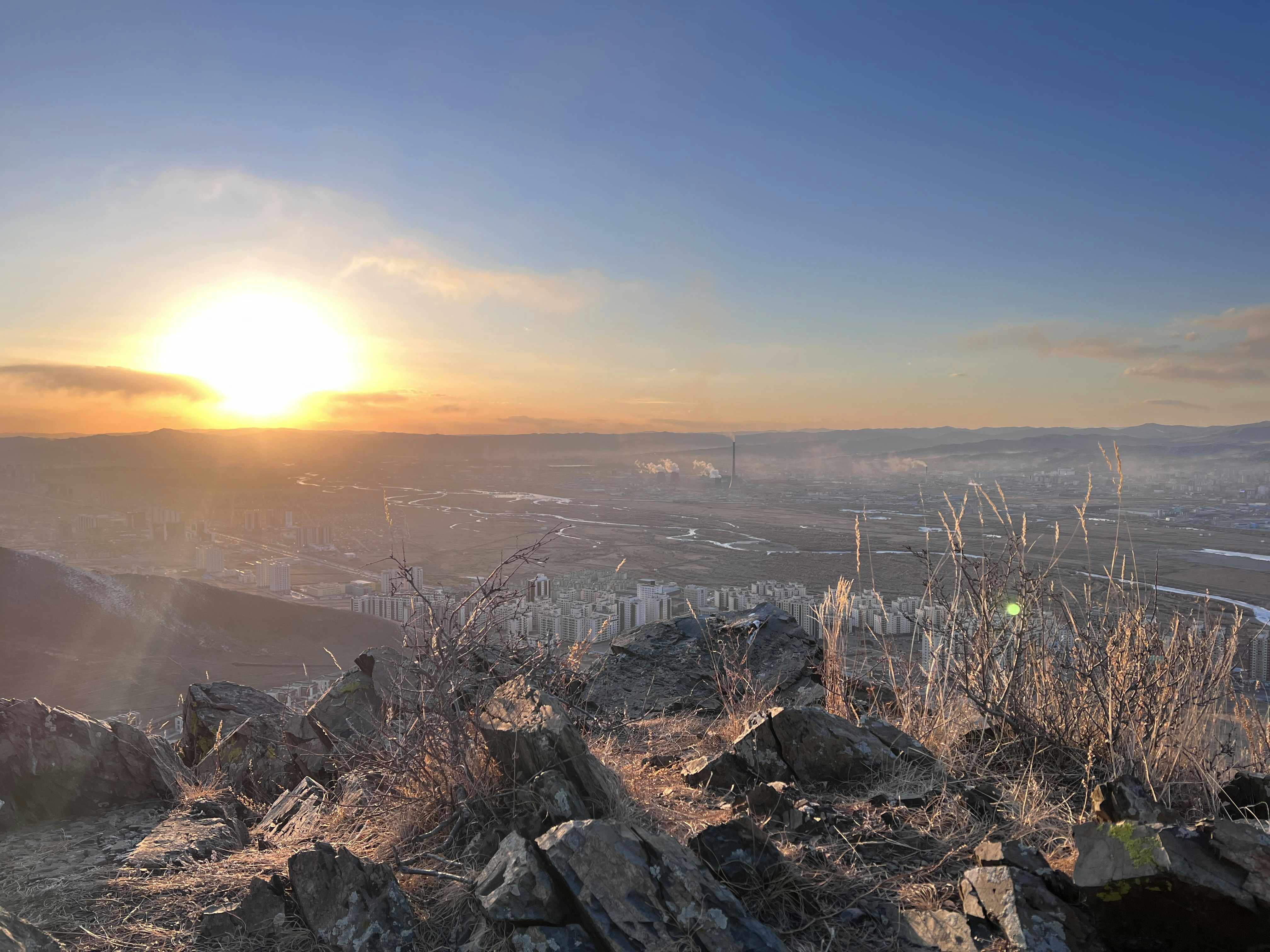 Sunrise view from Arthur's Seat with Edinburgh in the distance