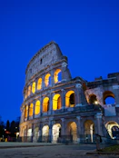 the colossion is lit up at night