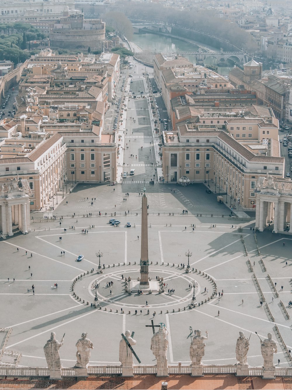 an aerial view of a city with a clock tower