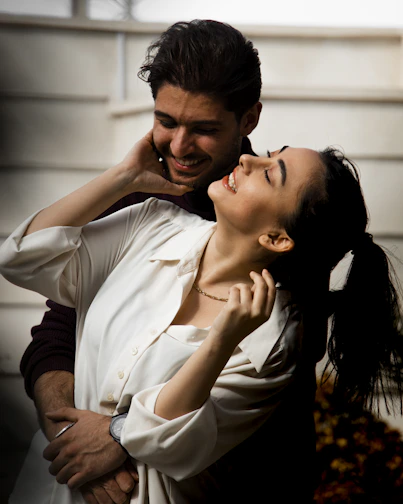 a man and a woman embracing each other