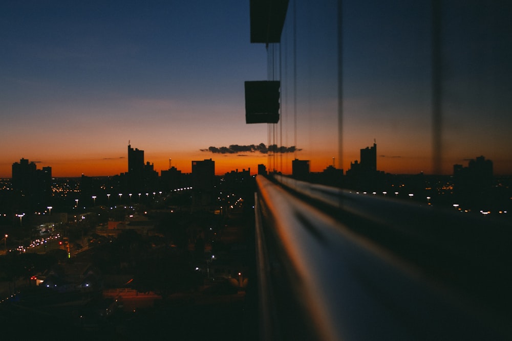 a view of a city at night from a window