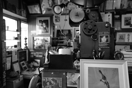 A cozy corner with film memorabilia and photographs from past events.