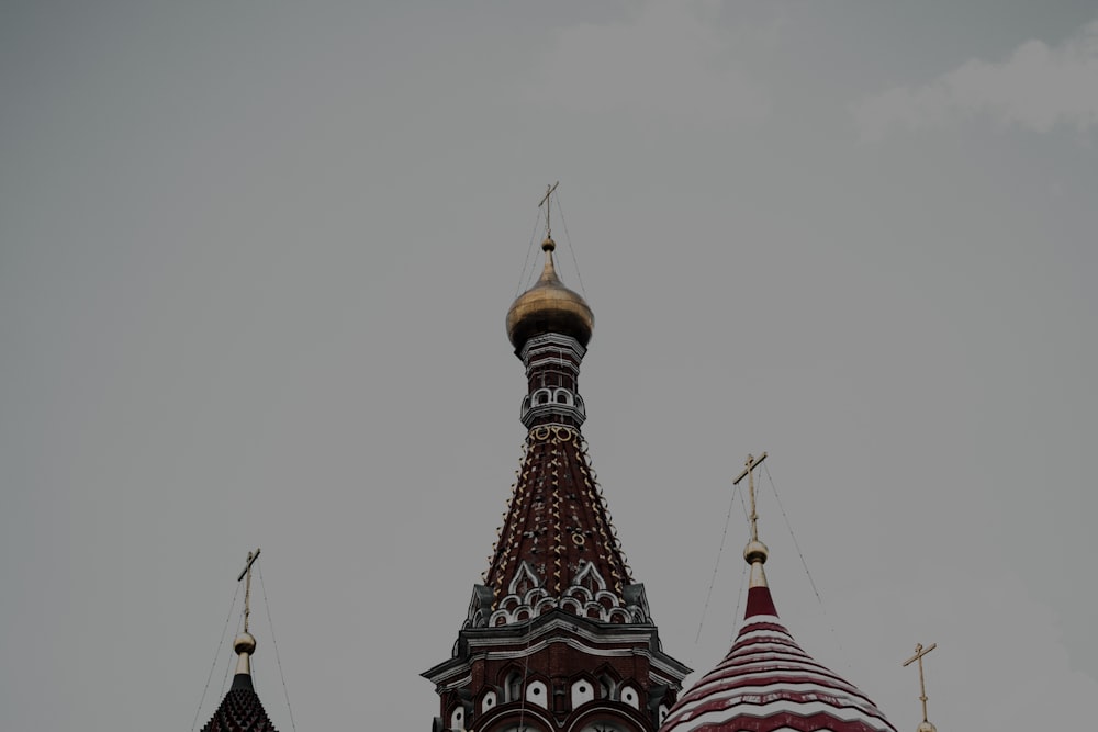 a very tall building with a clock on it's side