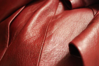 a close up of a red leather material