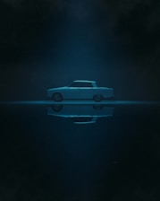 a car in the middle of a body of water