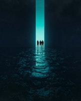 Three silhouetted figures stand in front of a large, illuminated vertical doorway. The scene is dark with a reflective surface below, adding a sense of mystery and exploration.