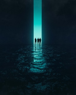 Three silhouetted figures stand in front of a large, illuminated vertical doorway. The scene is dark with a reflective surface below, adding a sense of mystery and exploration.