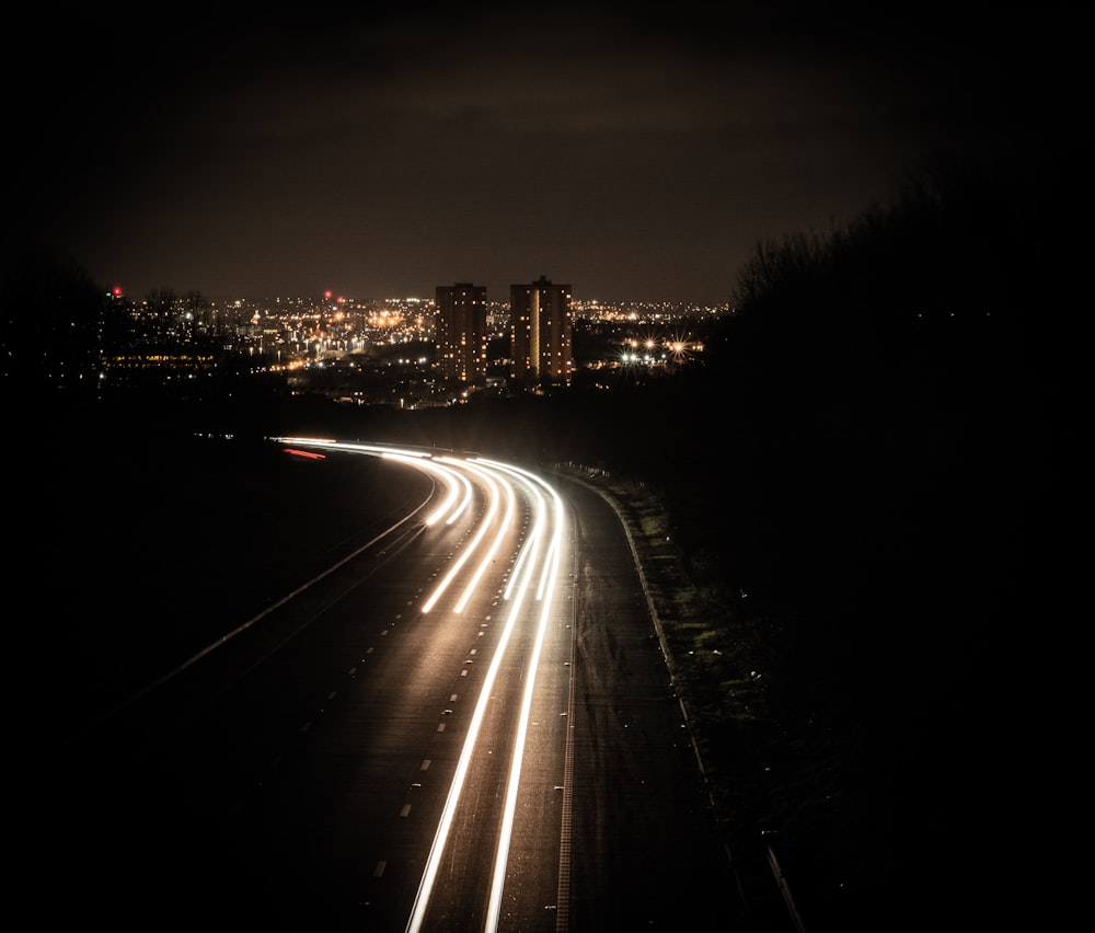 a long exposure photo of a city at night