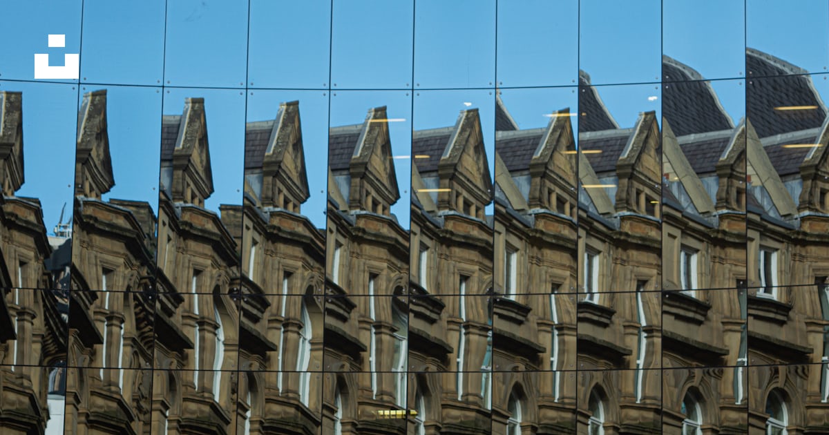 A reflection of a building in a mirror photo – Free Repeating pattern ...