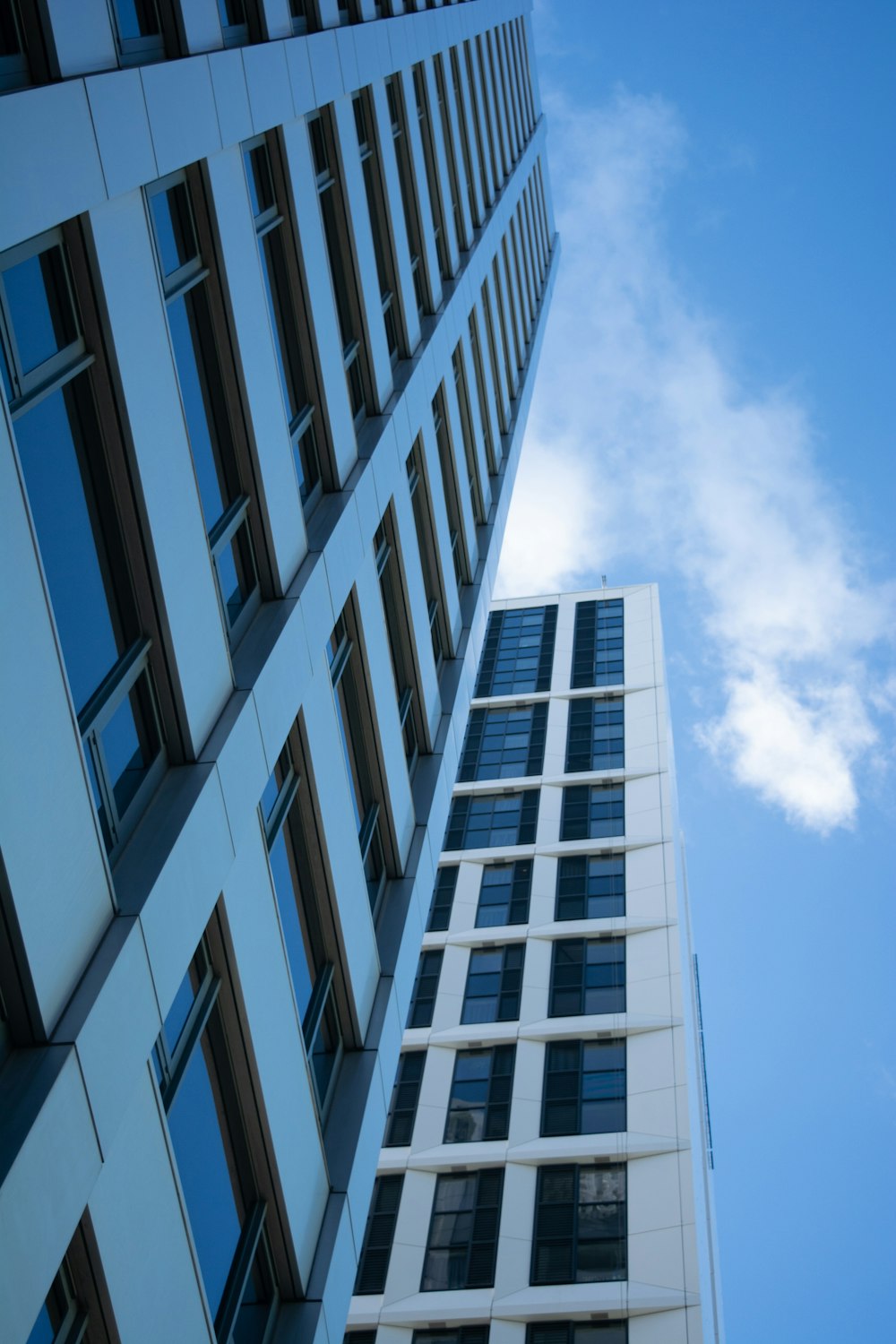 a tall building next to another tall building