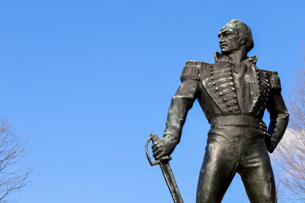 a statue of a soldier holding a sword