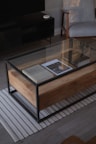 a coffee table with a book on top of it