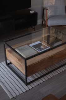 a coffee table with a book on top of it