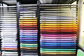 A vibrant display of custom-designed folders in various colors and patterns.