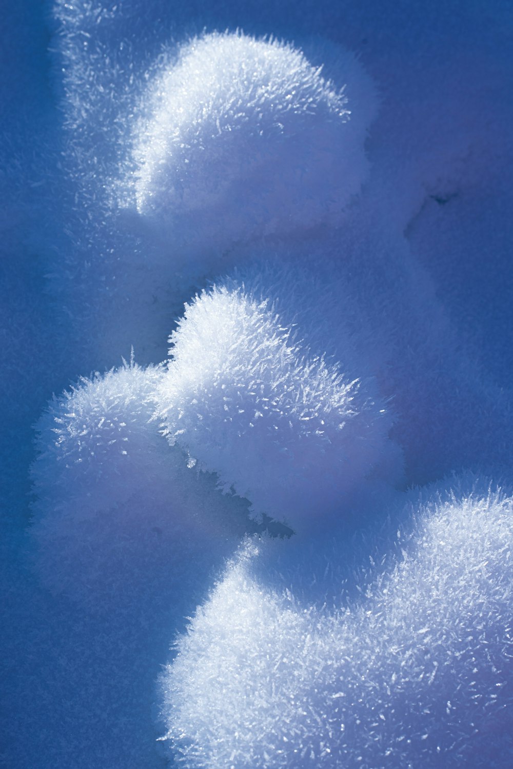 a close up of snow on the ground