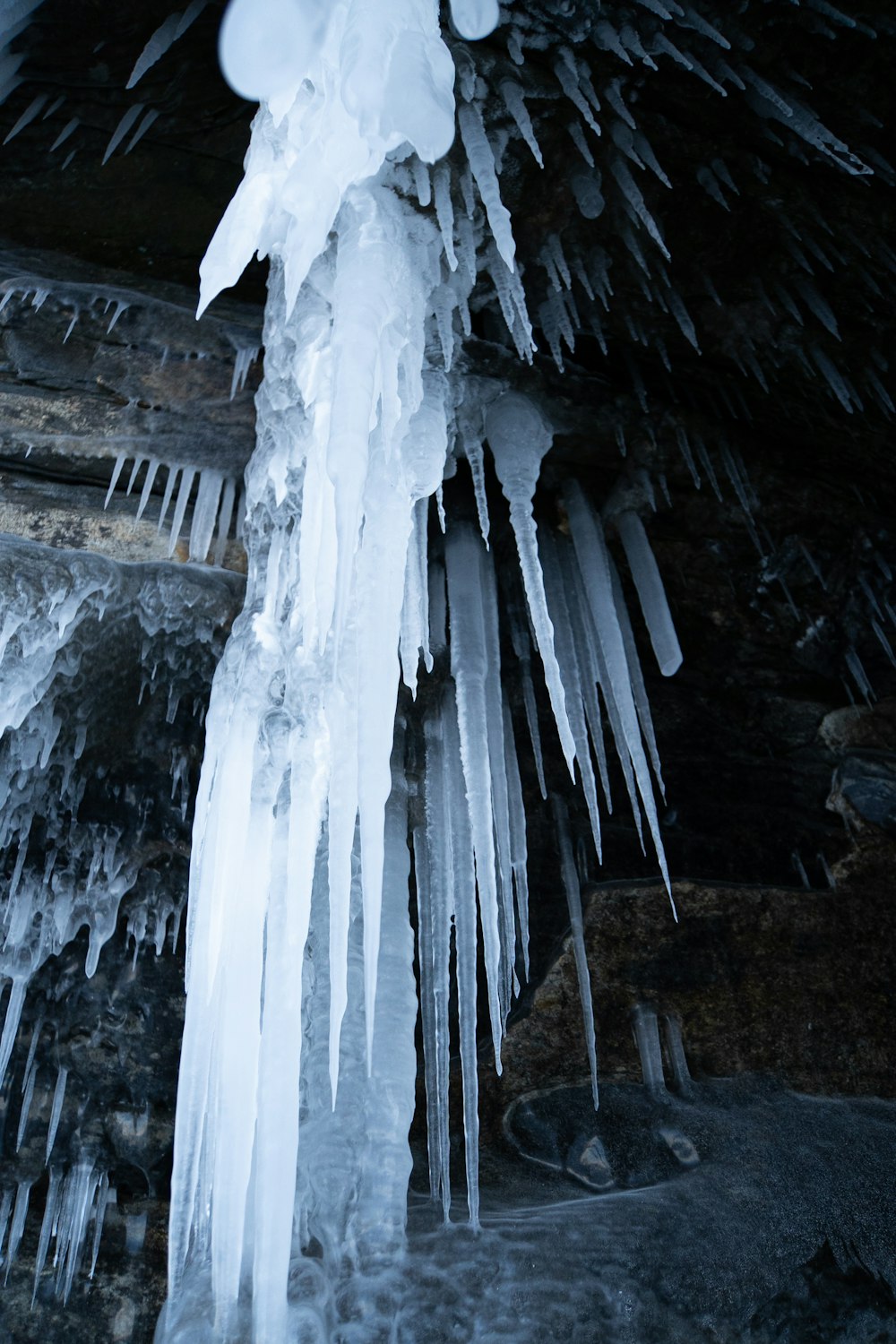 icicles hanging from the ceiling of a cave
